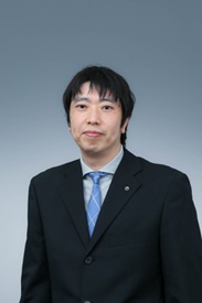 神原 健一の人物写真