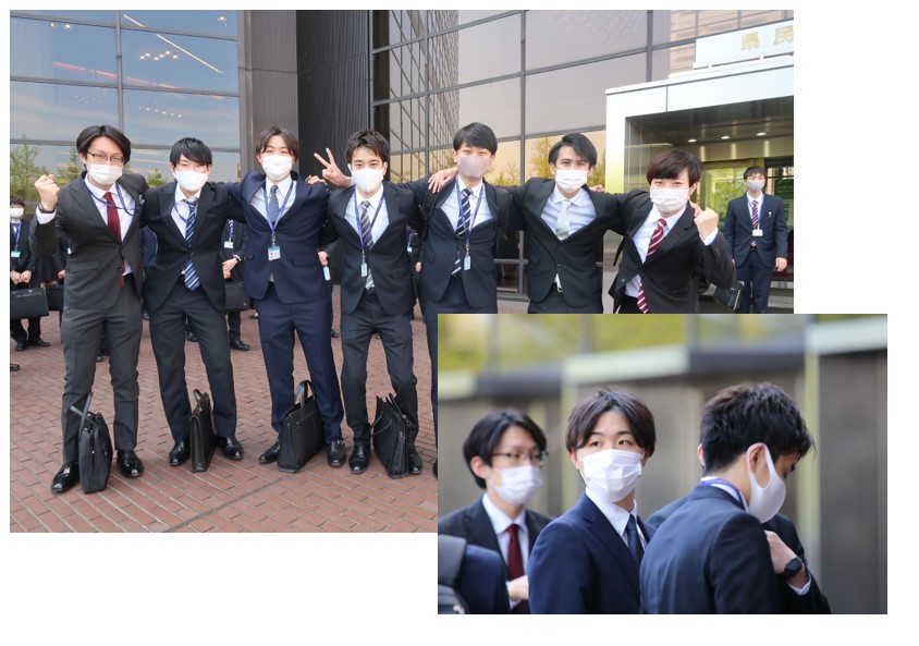 増渕 仁史と同期 6名との記念写真 、マスクをしている増渕 仁史の上半身の写真