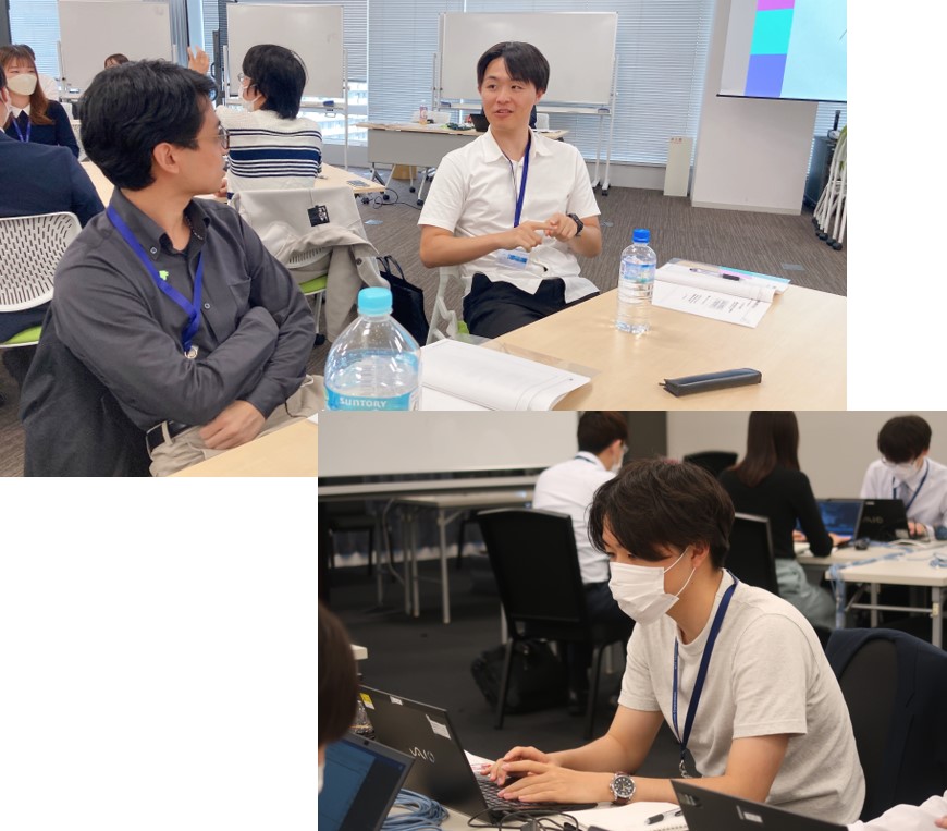 チームメンバーの一人と会話中の増渕 仁史とPC作業中のマスクをしている増渕仁史の写真